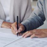 a senior couple meeting about estate planning