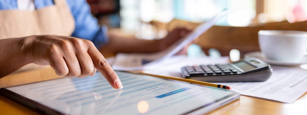 Small business owner reviewing their accounting