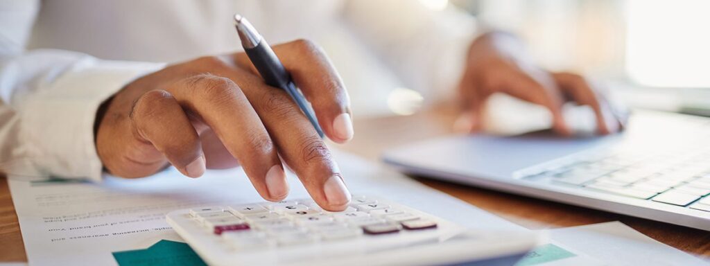 Man working out his business budget strategy.